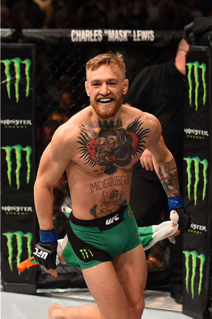 LAS VEGAS, NV - DECEMBER 12:  Conor McGregor of Ireland reacts to his victory over Jose Aldo of Brazil in their UFC featherweight championship bout during the UFC 194 event inside MGM Grand Garden Arena on December 12, 2015 in Las Vegas, Nevada.  (Photo b