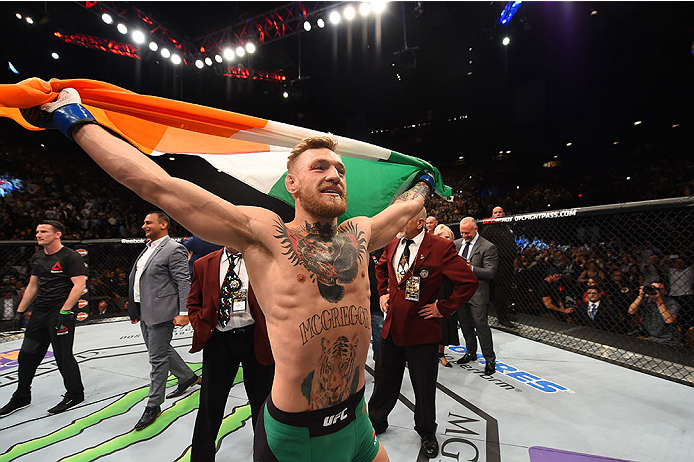 LAS VEGAS, NV - DECEMBER 12: Conor McGregor of Ireland reacts to his victory over Jose Aldo of Brazil in their UFC featherweight championship bout during the UFC 194 event inside MGM Grand Garden Arena on December 12, 2015 in Las Vegas, Nevada.  (Photo by