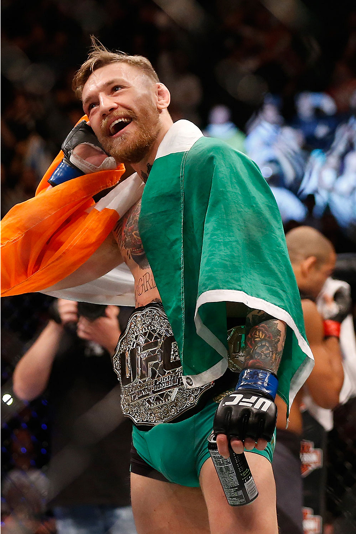 LAS VEGAS, NV - DECEMBER 12: Conor McGregor of Ireland reacts to his victory over Jose Aldo of Brazil in their UFC featherweight championship bout during the UFC 194 event inside MGM Grand Garden Arena on December 12, 2015 in Las Vegas, Nevada. (Photo b