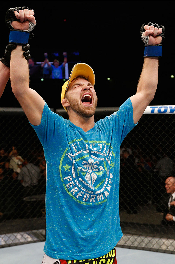 ALBUQUERQUE, NM - JUNE 07:  Bryan Caraway reacts after his submission victory over Erik Perez in their bantamweight fight during the UFC Fight Night event at Tingley Coliseum on June 7, 2014 in Albuquerque, New Mexico.  (Photo by Josh Hedges/Zuffa LLC/Zuf