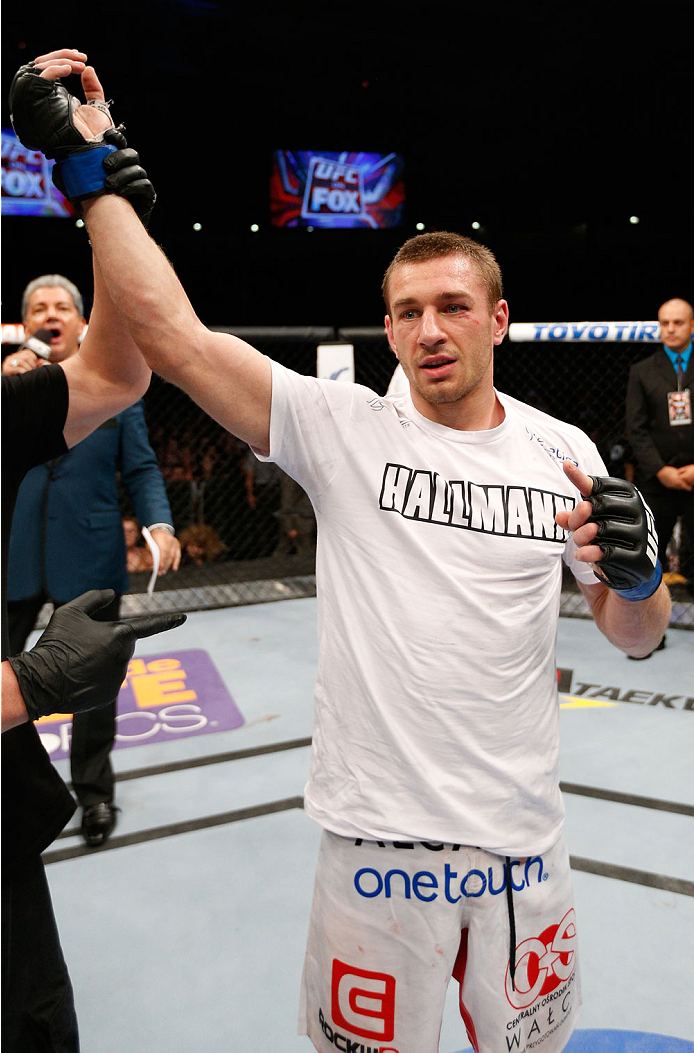 ALBUQUERQUE, NM - JUNE 07:  Piotr Hallmann reacts after his submission victory over Yves Edwards in their lightweight fight during the UFC Fight Night event at Tingley Coliseum on June 7, 2014 in Albuquerque, New Mexico.  (Photo by Josh Hedges/Zuffa LLC/Z