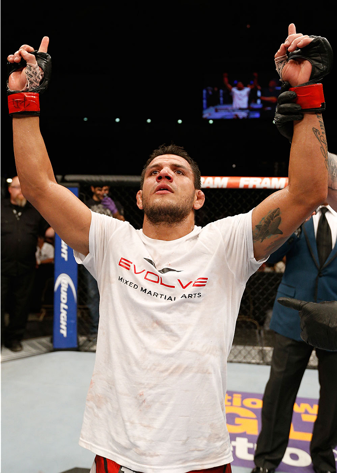 ALBUQUERQUE, NM - JUNE 07:  Rafael Dos Anjos reacts after defeating Jason High in their lightweight fight during the UFC Fight Night event at Tingley Coliseum on June 7, 2014 in Albuquerque, New Mexico.  (Photo by Josh Hedges/Zuffa LLC/Zuffa LLC via Getty