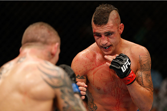 ALBUQUERQUE, NM - JUNE 07:  (R-L) Diego Sanchez battles Ross Pearson in their lightweight fight during the UFC Fight Night event at Tingley Coliseum on June 7, 2014 in Albuquerque, New Mexico.  (Photo by Josh Hedges/Zuffa LLC/Zuffa LLC via Getty Images)