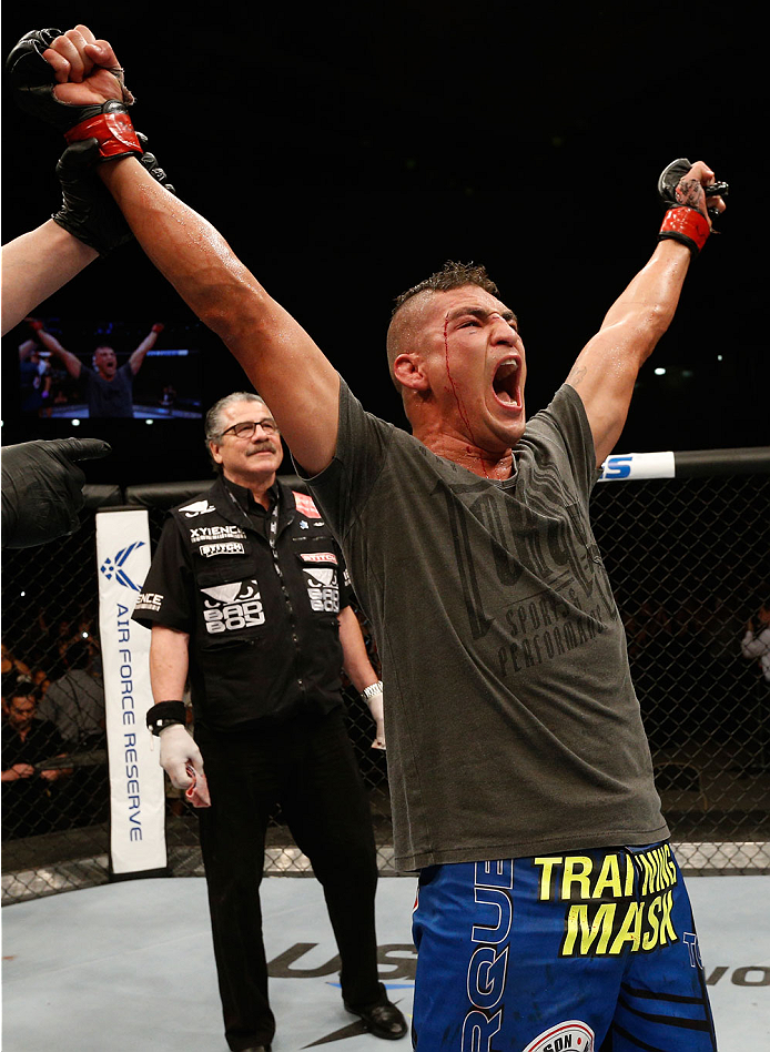 ALBUQUERQUE, NM - JUNE 07: Diego Sanchez reacts after his split decision victory over Ross Pearson in their lightweight fight during the UFC Fight Night event at Tingley Coliseum on June 7, 2014 in Albuquerque, New Mexico. (Photo by Josh Hedges/Zuffa LL