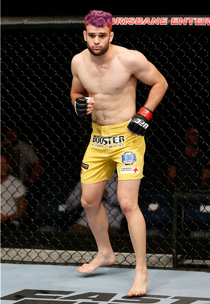 BRISBANE, AUSTRALIA - DECEMBER 07: Ben Wall stands in the Octagon before his welterweight fight against Alex Garcia during the UFC Fight Night event at the Brisbane Entertainment Centre on December 7, 2013 in Brisbane, Australia. (Photo by Josh Hedges/Zu