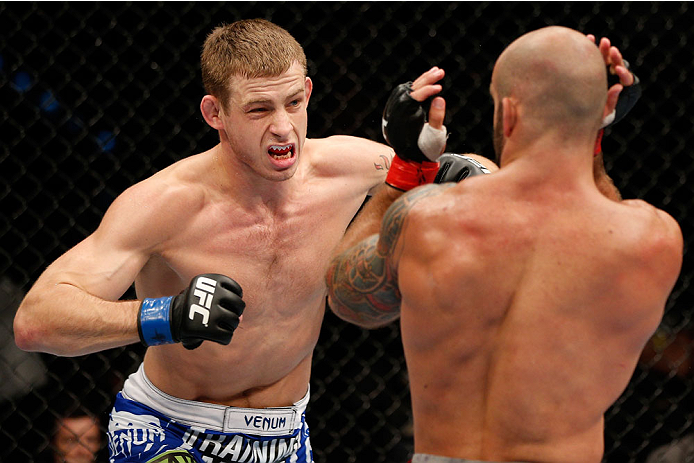BRISBANE, AUSTRALIA - DECEMBER 07: (L-R) Krzysztof Jotko punches Bruno Santos in their middleweight fight during the UFC Fight Night event at the Brisbane Entertainment Centre on December 7, 2013 in Brisbane, Australia. (Photo by Josh Hedges/Zuffa LLC/Zu