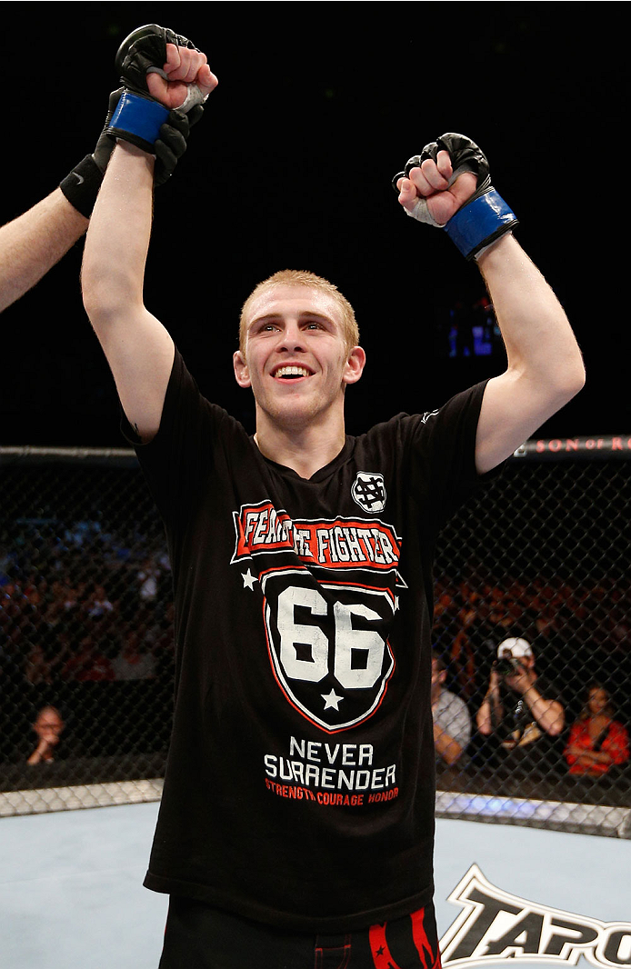 BRISBANE, AUSTRALIA - DECEMBER 07: Justin Scoggins reacts after his TKO victory over Richie Vaculik in their flyweight fight during the UFC Fight Night event at the Brisbane Entertainment Centre on December 7, 2013 in Brisbane, Australia. (Photo by Josh