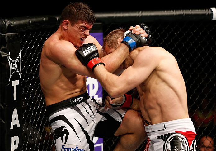 BRISBANE, AUSTRALIA - DECEMBER 07: (L-R) Caio Magalhaes knees Nick Ring in their middleweight fight during the UFC Fight Night event at the Brisbane Entertainment Centre on December 7, 2013 in Brisbane, Australia. (Photo by Josh Hedges/Zuffa LLC/Zuffa LL