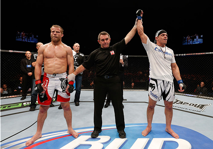 BRISBANE, AUSTRALIA - DECEMBER 07: Caio Magalhaes (R) reacts after his decision victory over Nick Ring (L) in their middleweight fight during the UFC Fight Night event at the Brisbane Entertainment Centre on December 7, 2013 in Brisbane, Australia. (Phot