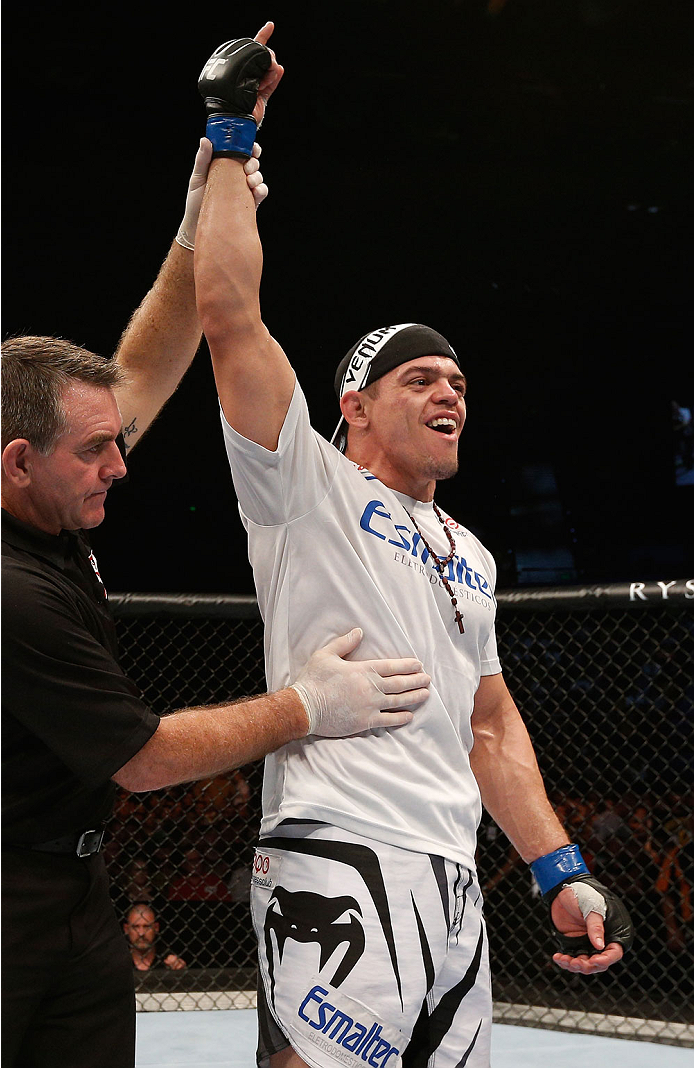 BRISBANE, AUSTRALIA - DECEMBER 07: Caio Magalhaes reacts after his decision victory over Nick Ring in their middleweight fight during the UFC Fight Night event at the Brisbane Entertainment Centre on December 7, 2013 in Brisbane, Australia. (Photo by Jo