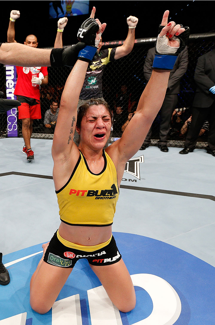 BRISBANE, AUSTRALIA - DECEMBER 07: Bethe Correia reacts after defeating Julie Kedzie by split decision in their women's bantamweight fight during the UFC Fight Night event at the Brisbane Entertainment Centre on December 7, 2013 in Brisbane, Australia. (