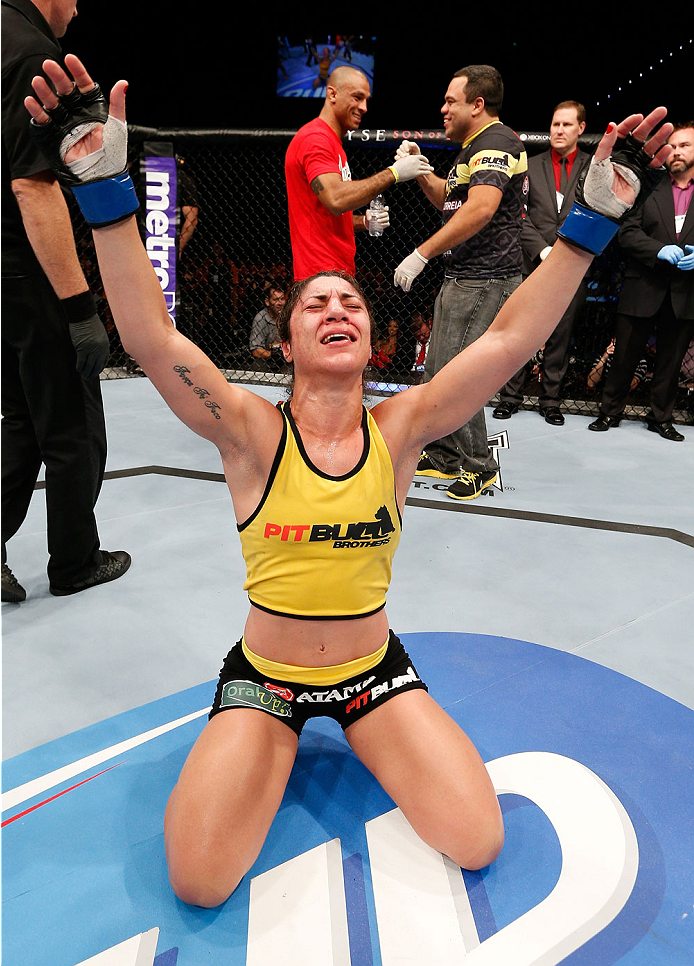BRISBANE, AUSTRALIA - DECEMBER 07: Bethe Correia reacts after defeating Julie Kedzie by split decision in their women's bantamweight fight during the UFC Fight Night event at the Brisbane Entertainment Centre on December 7, 2013 in Brisbane, Australia. (