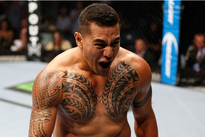BRISBANE, AUSTRALIA - DECEMBER 07: Soa Palelei reacts after his TKO victory over Pat Barry in their heavyweight fight during the UFC Fight Night event at the Brisbane Entertainment Centre on December 7, 2013 in Brisbane, Australia. (Photo by Josh Hedges/