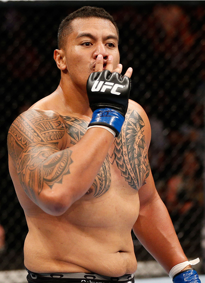 BRISBANE, AUSTRALIA - DECEMBER 07: Soa Palelei reacts after his TKO victory over Pat Barry in their heavyweight fight during the UFC Fight Night event at the Brisbane Entertainment Centre on December 7, 2013 in Brisbane, Australia. (Photo by Josh Hedges/