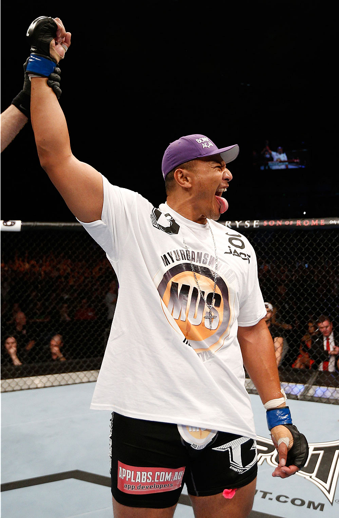 BRISBANE, AUSTRALIA - DECEMBER 07: Soa Palelei reacts after his TKO victory over Pat Barry in their heavyweight fight during the UFC Fight Night event at the Brisbane Entertainment Centre on December 7, 2013 in Brisbane, Australia. (Photo by Josh Hedges/
