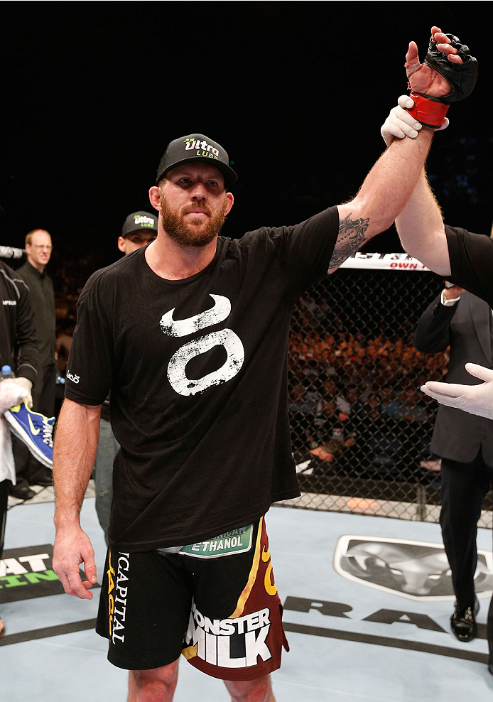 BRISBANE, AUSTRALIA - DECEMBER 07: Ryan Bader reacts after his decision victory over Anthony Perosh in their light heavyweight fight during the UFC Fight Night event at the Brisbane Entertainment Centre on December 7, 2013 in Brisbane, Australia. (Photo