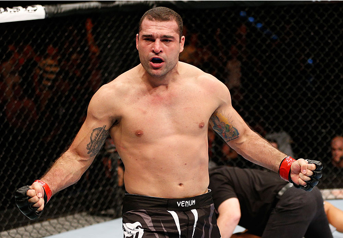 BRISBANE, AUSTRALIA - DECEMBER 07: Mauricio "Shogun" Rua reacts after knocking out James Te Huna in their light heavyweight fight during the UFC Fight Night event at the Brisbane Entertainment Centre on December 7, 2013 in Brisbane, Australia. (Photo by