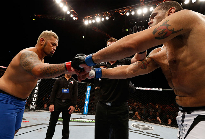 BRISBANE, AUSTRALIA - DECEMBER 07: (L-R) Opponents Mark Hunt and Antonio "Bigfoot" Silva face off before their heavyweight fight during the UFC Fight Night event at the Brisbane Entertainment Centre on December 7, 2013 in Brisbane, Australia. (Photo by J