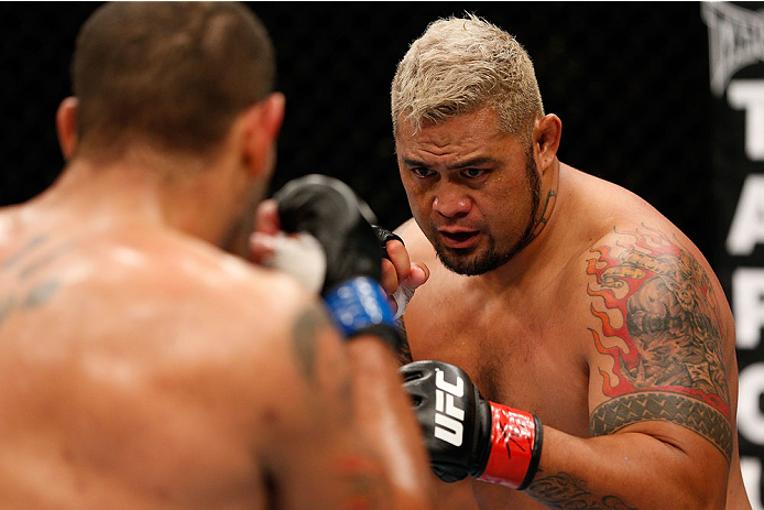 BRISBANE, AUSTRALIA - DECEMBER 07: (R-L) Mark Hunt squares off with Antonio "Bigfoot" Silva in their heavyweight fight during the UFC Fight Night event at the Brisbane Entertainment Centre on December 7, 2013 in Brisbane, Australia. (Photo by Josh Hedges