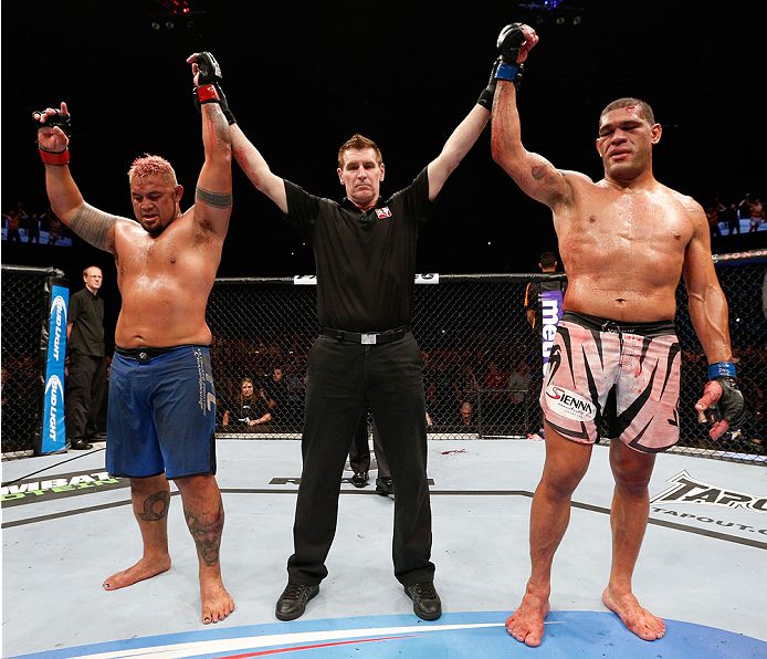 BRISBANE, AUSTRALIA - DECEMBER 07: The heavyweight fight between Mark Hunt (L) and Antonio "Bigfoot" Silva (R) is declared a majority draw during the UFC Fight Night event at the Brisbane Entertainment Centre on December 7, 2013 in Brisbane, Australia. (