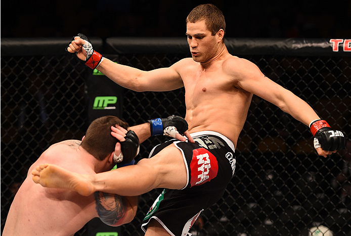BOSTON, MA - JANUARY 18: (R-L) Matt Van Buren kicks Sean O'Connell in their light heavyweight fight during the UFC Fight Night event at the TD Garden on January 18, 2015 in Boston, Massachusetts. (Photo by Jeff Bottari/Zuffa LLC/Zuffa LLC via Getty Image