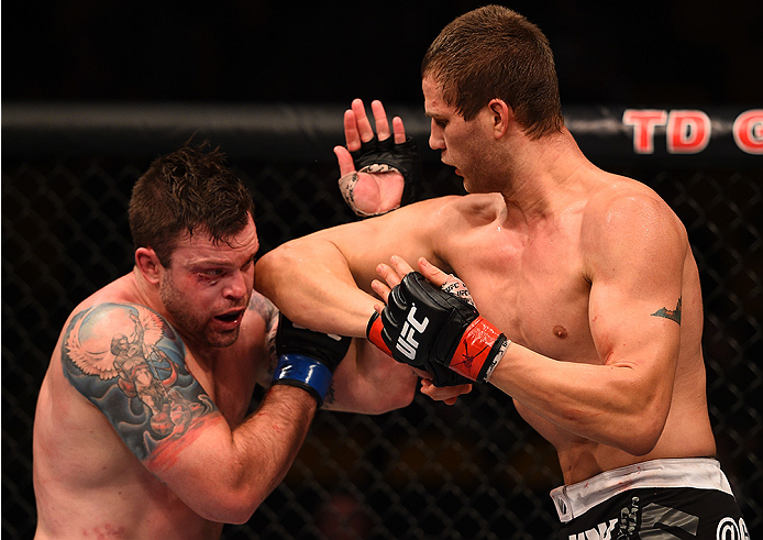 BOSTON, MA - JANUARY 18: (R-L) Matt Van Buren elbows Sean O'Connell in their light heavyweight fight during the UFC Fight Night event at the TD Garden on January 18, 2015 in Boston, Massachusetts. (Photo by Jeff Bottari/Zuffa LLC/Zuffa LLC via Getty Imag