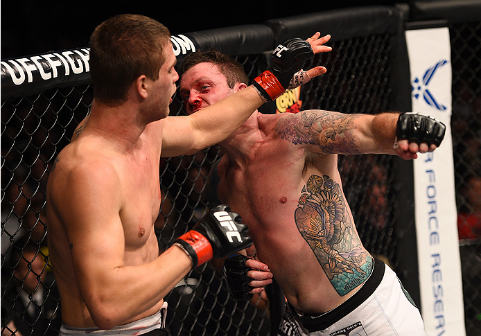 BOSTON, MA - JANUARY 18:  (R-L) Sean O'Connell punches Matt Van Buren in their light heavyweight fight during the UFC Fight Night event at the TD Garden on January 18, 2015 in Boston, Massachusetts. (Photo by Jeff Bottari/Zuffa LLC/Zuffa LLC via Getty Ima