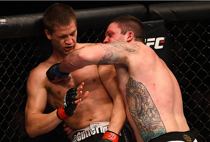 BOSTON, MA - JANUARY 18: (R-L) Sean O'Connell punches Matt Van Buren in their light heavyweight fight during the UFC Fight Night event at the TD Garden on January 18, 2015 in Boston, Massachusetts. (Photo by Jeff Bottari/Zuffa LLC/Zuffa LLC via Getty Ima