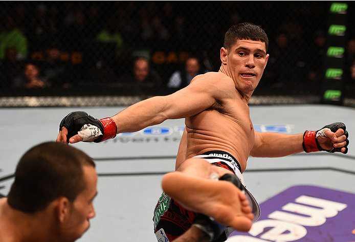 BOSTON, MA - JANUARY 18: (R-L) Charles Rosa kicks Sean Soriano in their featherweight fight during the UFC Fight Night event at the TD Garden on January 18, 2015 in Boston, Massachusetts. (Photo by Jeff Bottari/Zuffa LLC/Zuffa LLC via Getty Images)