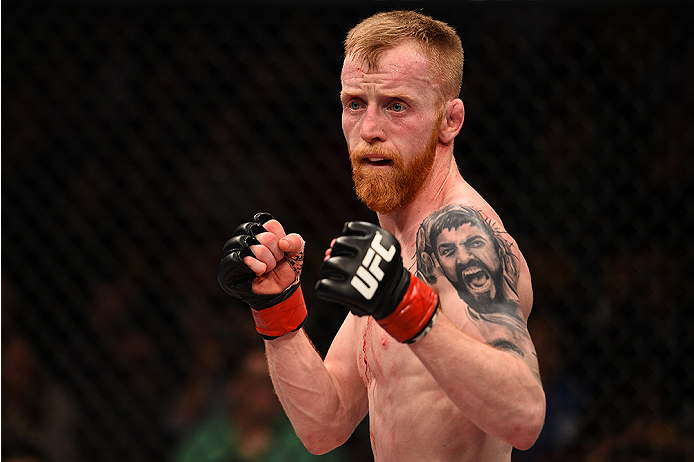 BOSTON, MA - JANUARY 18:  Paddy Holohan fights Shane Howell in their flyweight fight during the UFC Fight Night event at the TD Garden on January 18, 2015 in Boston, Massachusetts. (Photo by Jeff Bottari/Zuffa LLC/Zuffa LLC via Getty Images)