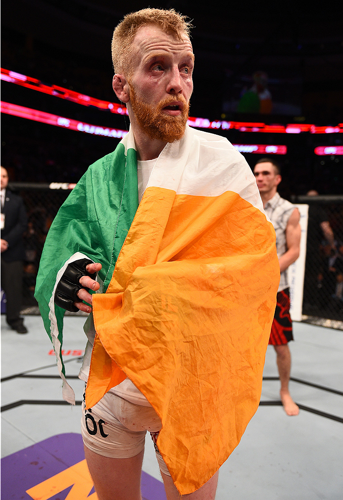 BOSTON, MA - JANUARY 18:  Paddy Holohan reacts after defeating Shane Howell in their flyweight fight during the UFC Fight Night event at the TD Garden on January 18, 2015 in Boston, Massachusetts. (Photo by Jeff Bottari/Zuffa LLC/Zuffa LLC via Getty Image