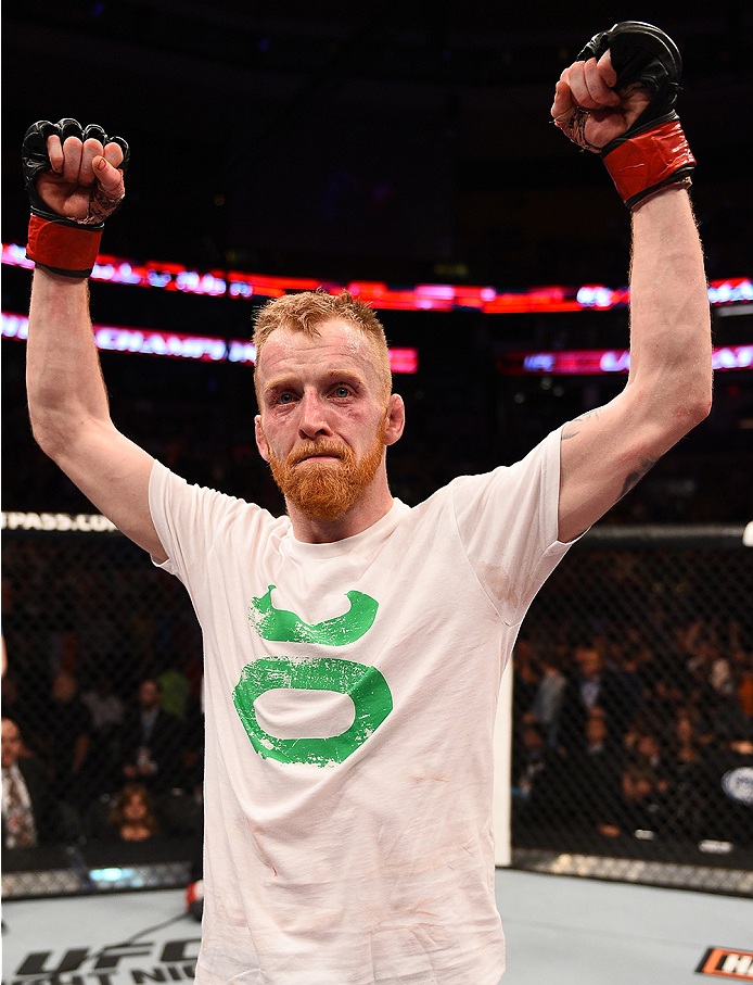 BOSTON, MA - JANUARY 18:  Paddy Holohan reacts after defeating Shane Howell in their flyweight fight during the UFC Fight Night event at the TD Garden on January 18, 2015 in Boston, Massachusetts. (Photo by Jeff Bottari/Zuffa LLC/Zuffa LLC via Getty Image