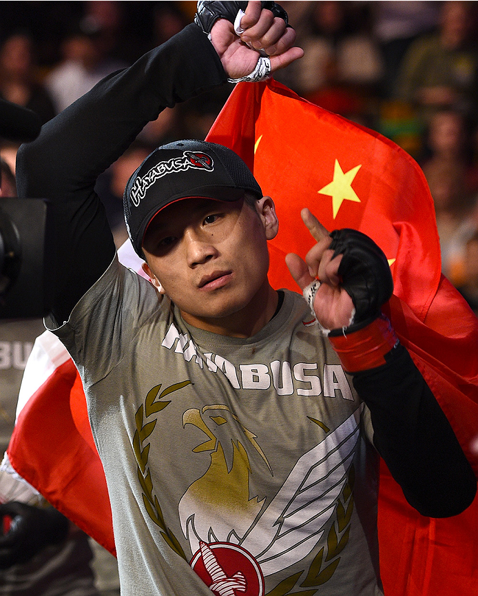 BOSTON, MA - JANUARY 18:  Zhang Lipeng enters the arena before a lightweight fight against Chris Wade during the UFC Fight Night event at the TD Garden on January 18, 2015 in Boston, Massachusetts. (Photo by Jeff Bottari/Zuffa LLC/Zuffa LLC via Getty Imag