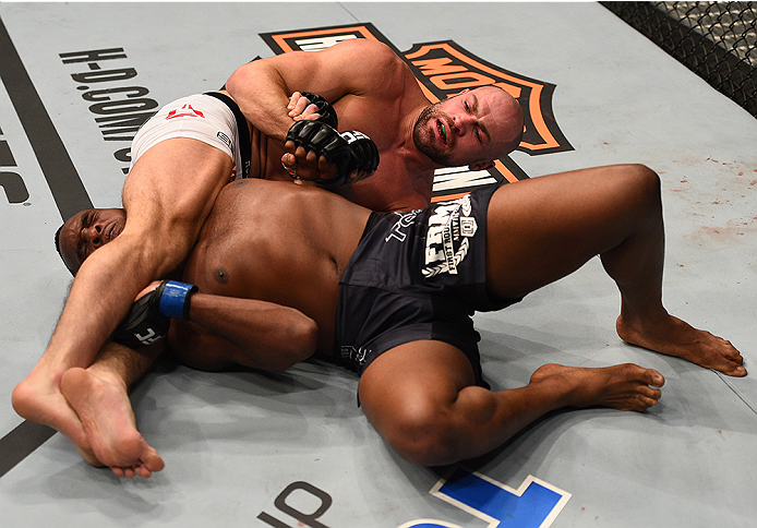 BOSTON, MA - JANUARY 18: (L-R) Cathal Pendred fights Sean Spencer in their welterweight fight during the UFC Fight Night event at the TD Garden on January 18, 2015 in Boston, Massachusetts. (Photo by Jeff Bottari/Zuffa LLC/Zuffa LLC via Getty Images)