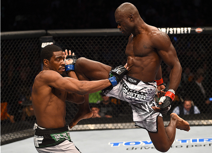 BOSTON, MA - JANUARY 18:  (R-L) Uriah Hall knees Ron Stallings in their middleweight fight during the UFC Fight Night event at the TD Garden on January 18, 2015 in Boston, Massachusetts. (Photo by Jeff Bottari/Zuffa LLC/Zuffa LLC via Getty Images)