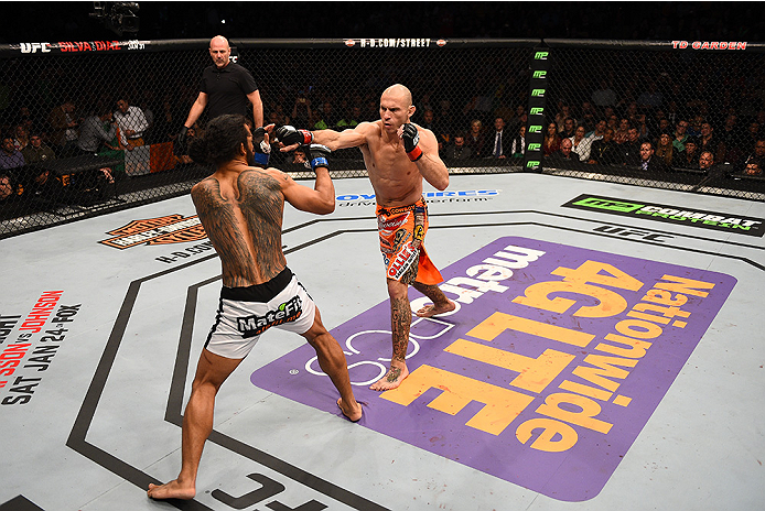 BOSTON, MA - JANUARY 18:  (L-R) Benson Henderson fights Donald Cerrone in their lightweight fight during the UFC Fight Night event at the TD Garden on January 18, 2015 in Boston, Massachusetts. (Photo by Jeff Bottari/Zuffa LLC/Zuffa LLC via Getty Images)