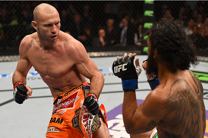 BOSTON, MA - JANUARY 18:  (L-R) Donald Cerrone fights Benson Henderson in their lightweight fight during the UFC Fight Night event at the TD Garden on January 18, 2015 in Boston, Massachusetts. (Photo by Jeff Bottari/Zuffa LLC/Zuffa LLC via Getty Images)