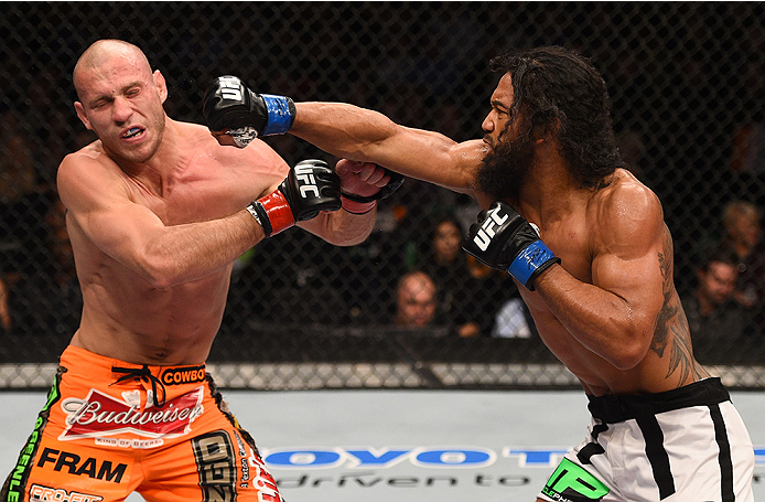 BOSTON, MA - JANUARY 18:  (R-L) Benson Henderson fights Donald Cerrone in their lightweight fight during the UFC Fight Night event at the TD Garden on January 18, 2015 in Boston, Massachusetts. (Photo by Jeff Bottari/Zuffa LLC/Zuffa LLC via Getty Images)