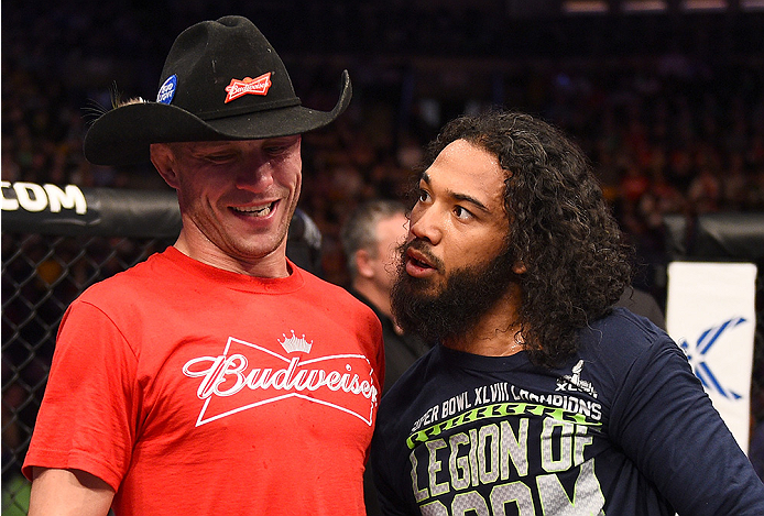 BOSTON, MA - JANUARY 18:  (L-R) Donald Cerrone and Benson Henderson embrace following their lightweight fight during the UFC Fight Night event at the TD Garden on January 18, 2015 in Boston, Massachusetts. (Photo by Jeff Bottari/Zuffa LLC/Zuffa LLC via Ge