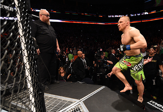 BOSTON, MA - JANUARY 18: Dennis Siver of Germany enters the Octagon before a featherweight fight against Conor McGregor of Ireland during the UFC Fight Night event at the TD Garden on January 18, 2015 in Boston, Massachusetts. (Photo by Jeff Bottari/Zuff