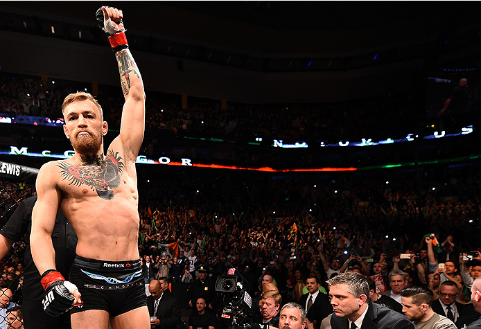 BOSTON, MA - JANUARY 18: Conor McGregor of Ireland reacts as he enters the Octagon before a featherweight fight against Dennis Siver of Germany during the UFC Fight Night event at the TD Garden on January 18, 2015 in Boston, Massachusetts. (Photo by Jeff
