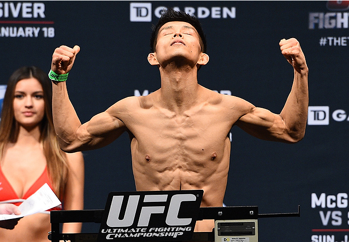 BOSTON, MA - JANUARY 17:  Tateki Matsuda steps on the scale during the UFC Fight Night Boston weigh-in event at the Orpheum Theatre on January 17, 2015 in Boston, Massachusetts. (Photo by Jeff Bottari/Zuffa LLC/Zuffa LLC via Getty Images)