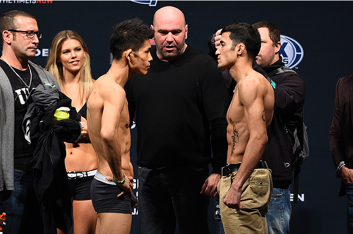 BOSTON, MA - JANUARY 17:  Tateki Matsuda (L) and Joby Sanchez face off during the UFC Fight Night Boston weigh-in event at the Orpheum Theatre on January 17, 2015 in Boston, Massachusetts. (Photo by Jeff Bottari/Zuffa LLC/Zuffa LLC via Getty Images)