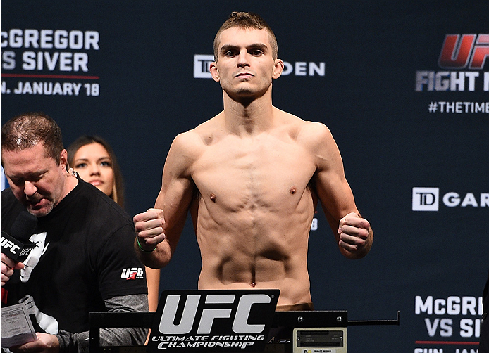 BOSTON, MA - JANUARY 17:  Johnny Case steps on the scale during the UFC Fight Night Boston weigh-in event at the Orpheum Theatre on January 17, 2015 in Boston, Massachusetts. (Photo by Jeff Bottari/Zuffa LLC/Zuffa LLC via Getty Images)