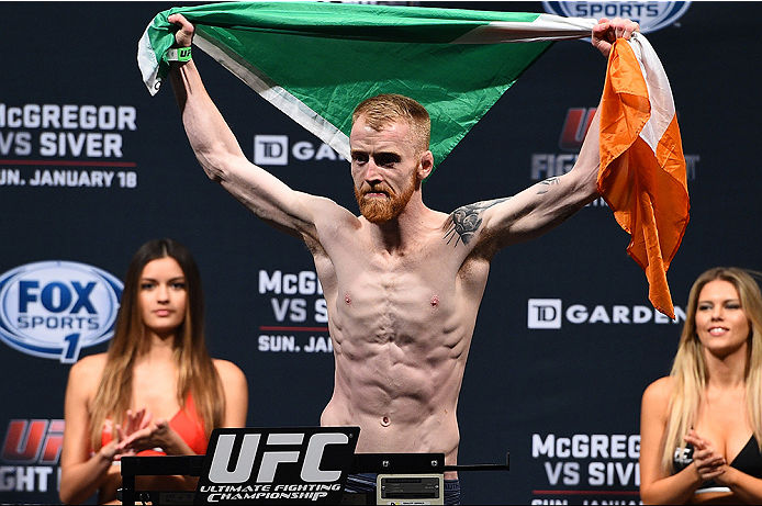 BOSTON, MA - JANUARY 17: Paddy Holohan of Ireland interacts with the crowd holding an Irish flag during the UFC Fight Night Boston weigh-in event at the Orpheum Theatre on January 17, 2015 in Boston, Massachusetts. (Photo by Jeff Bottari/Zuffa LLC/Zuffa