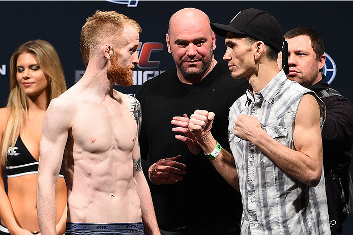 BOSTON, MA - JANUARY 17:   Paddy Holohan of Ireland (L) and Shane Howell face off during the UFC Fight Night Boston weigh-in event at the Orpheum Theatre on January 17, 2015 in Boston, Massachusetts. (Photo by Jeff Bottari/Zuffa LLC/Zuffa LLC via Getty Im