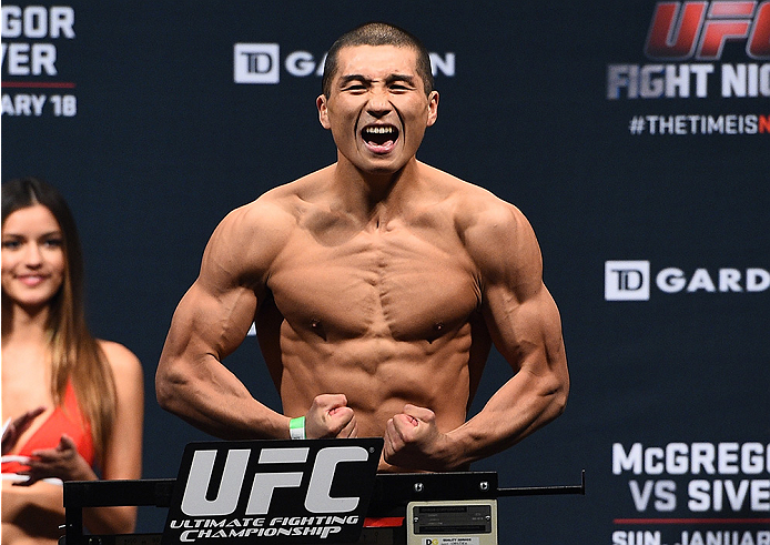 BOSTON, MA - JANUARY 17:  Zhang Lipeng steps on the scale during the UFC Fight Night Boston weigh-in event at the Orpheum Theatre on January 17, 2015 in Boston, Massachusetts. (Photo by Jeff Bottari/Zuffa LLC/Zuffa LLC via Getty Images)