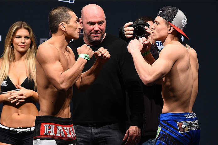 BOSTON, MA - JANUARY 17:  Zhang Lipeng (L) and Chris Wade face off during the UFC Fight Night Boston weigh-in event at the Orpheum Theatre on January 17, 2015 in Boston, Massachusetts. (Photo by Jeff Bottari/Zuffa LLC/Zuffa LLC via Getty Images)