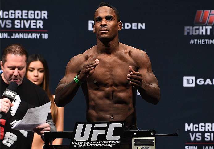 BOSTON, MA - JANUARY 17: Lorenz Larkin steps on the scale during the UFC Fight Night Boston weigh-in event at the Orpheum Theatre on January 17, 2015 in Boston, Massachusetts. (Photo by Jeff Bottari/Zuffa LLC/Zuffa LLC via Getty Images)