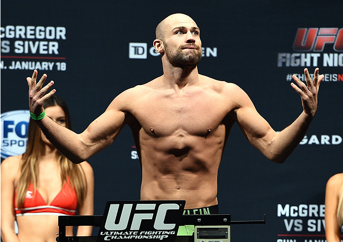 BOSTON, MA - JANUARY 17: Cathal Pendred of Ireland steps on the scale during the UFC Fight Night Boston weigh-in event at the Orpheum Theatre on January 17, 2015 in Boston, Massachusetts. (Photo by Jeff Bottari/Zuffa LLC/Zuffa LLC via Getty Images)